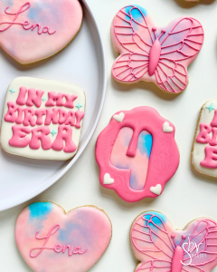 Taylor Swift Lover era inspired cookies with pink and pastel rainbow colors