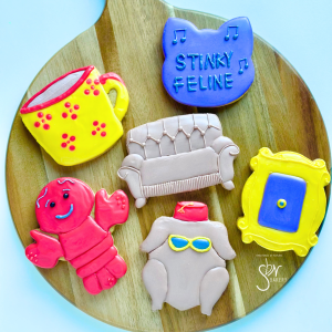 six decorated sugar cookies inspired by Friends TV show